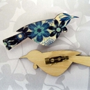 Tui Brooch